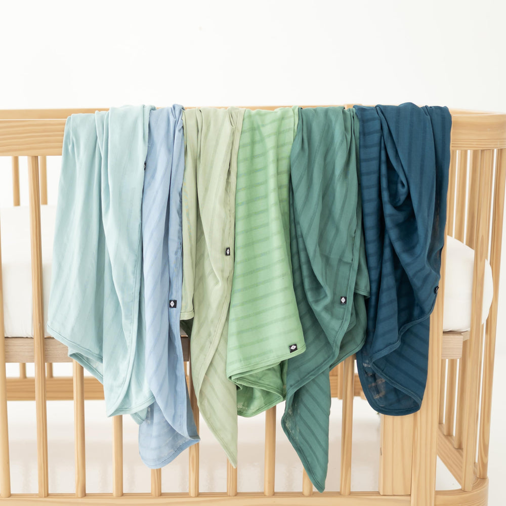 KYTE BABY swaddle blanket slate, 46x46 inches, offers versatile wrap opportunities.