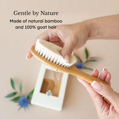 Kyte Baby bamboo handle cradle cap brush designed for safe, natural grooming.