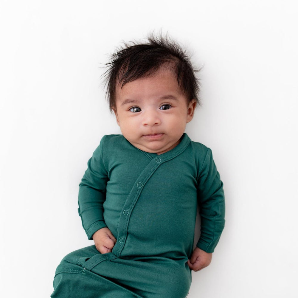 Fold-over cuffs on KYTE BABY Bundlers preemie prevent scratching.