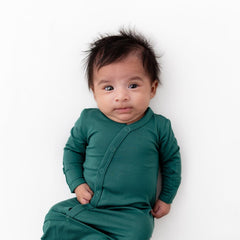 Fold-over cuffs on KYTE BABY Bundlers preemie prevent scratching.