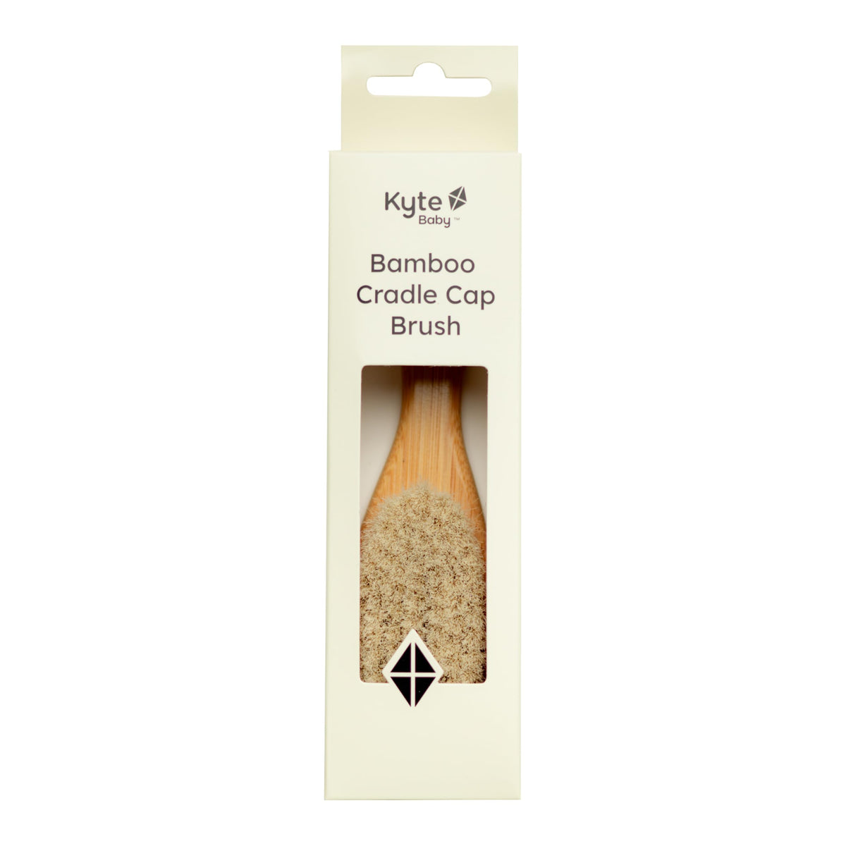 Kyte Baby cradle cap brush with goat hair bristles for gentle scalp massage.