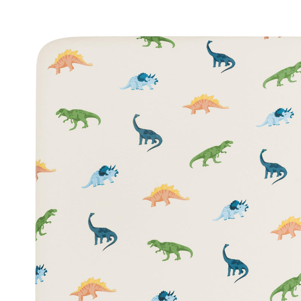 Kyte Baby ecru crib sheet closeup highlights soft texture