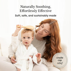 Kyte Baby cradle cap brush designed for safe use during bath time scalp care.