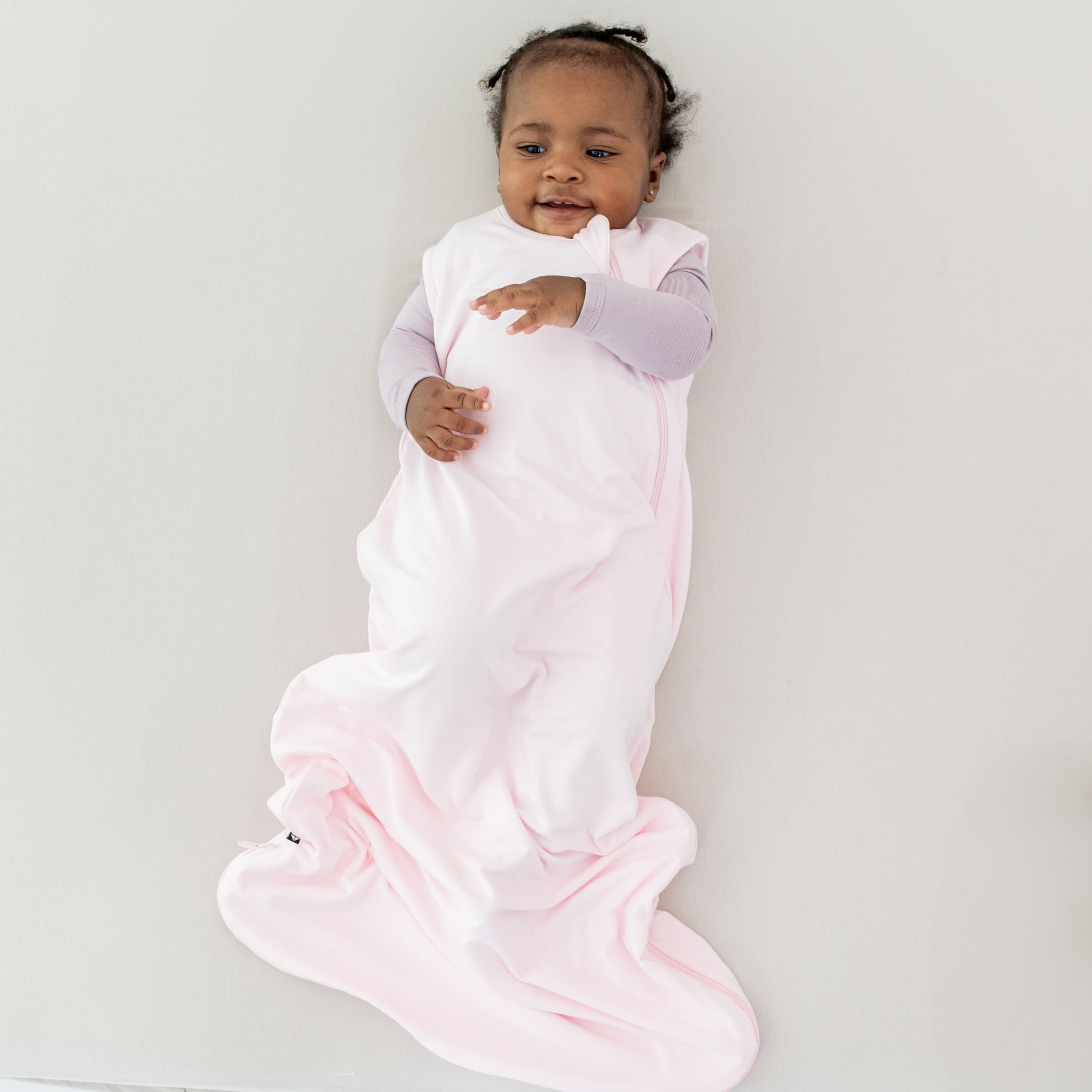 KYTE BABY sleep bag J-zipper design seen for quick middle-of-night diaper changes