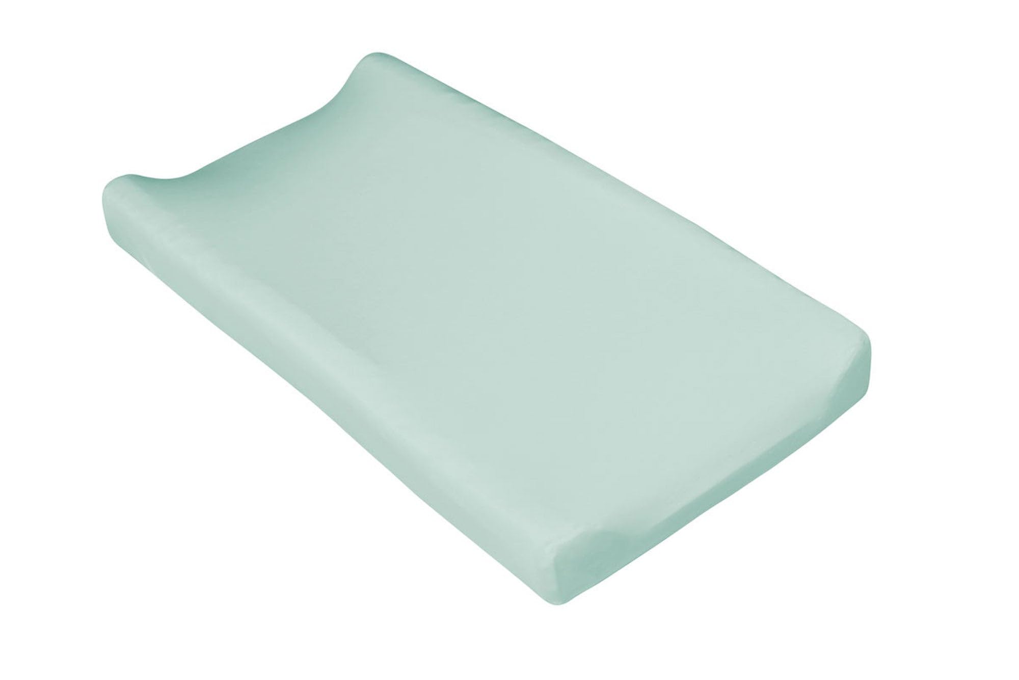 Kyte Baby change pad cover in sage provides silky bamboo rayon comfort for diaper changes.