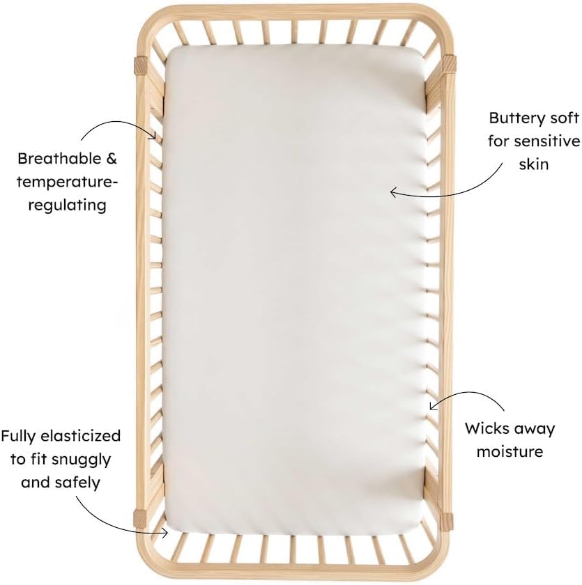 Kyte Baby stretchy elastic edge keeps sheet snug on standard 28x52 cribs