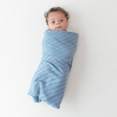 KYTE BABY swaddle blanket slate with woven stripe detail for cozy cuddles.