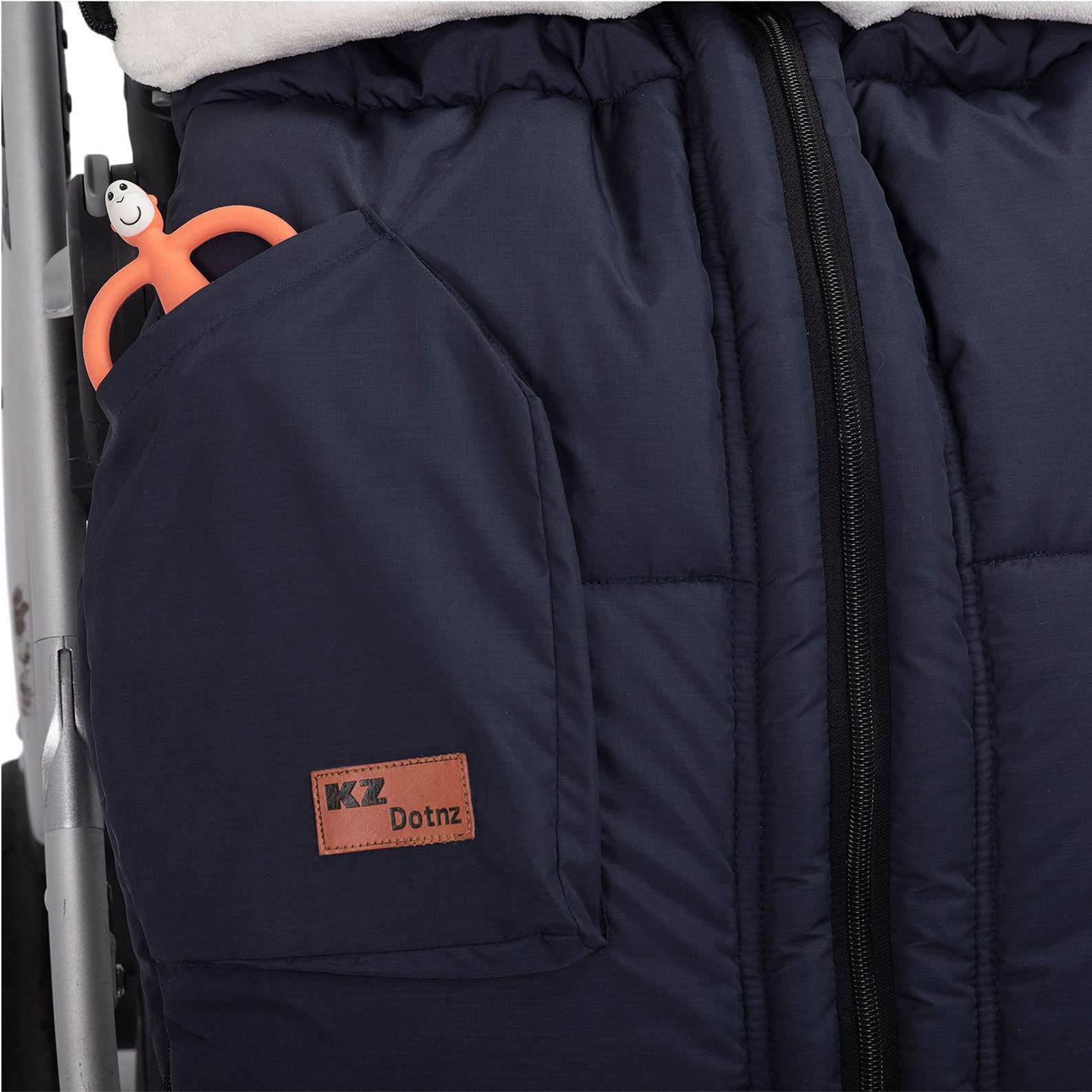 KZ Dotnz front snaps help regulate temperature for stroller comfort.