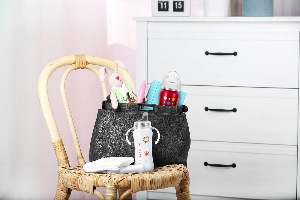 Ergonomic silicone handle supports little hands and grip.