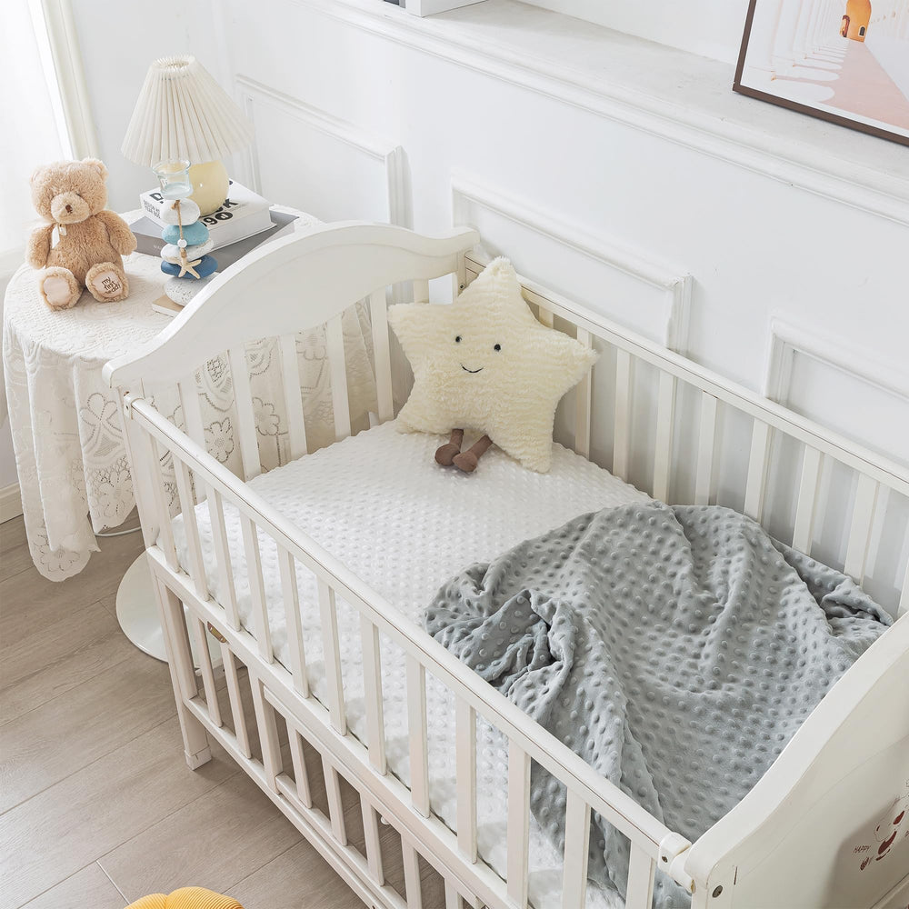 La Sheer fitted crib sheet — size 52x28 inches and 8-inch pocket for secure fit.