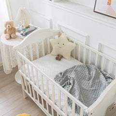 La Sheer fitted crib sheet — size 52x28 inches and 8-inch pocket for secure fit.