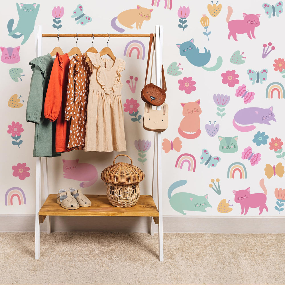 Ladinimo cat wall decals featuring butterflies for a playful bedroom.