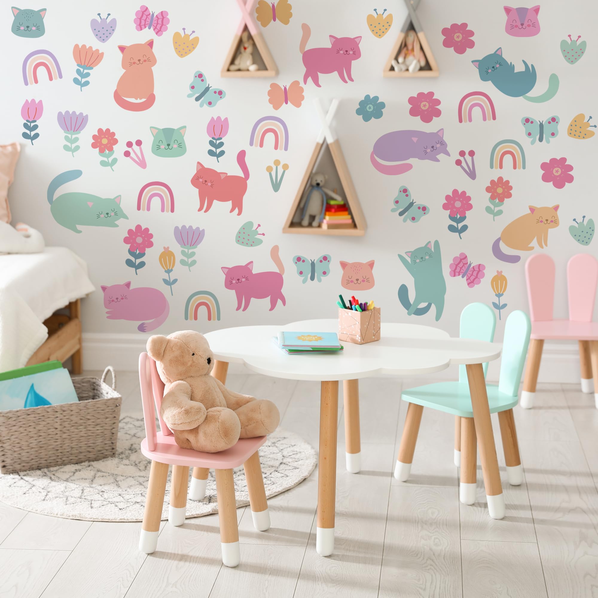 Ladinimo cat wall decals with rainbows for a cheerful space.
