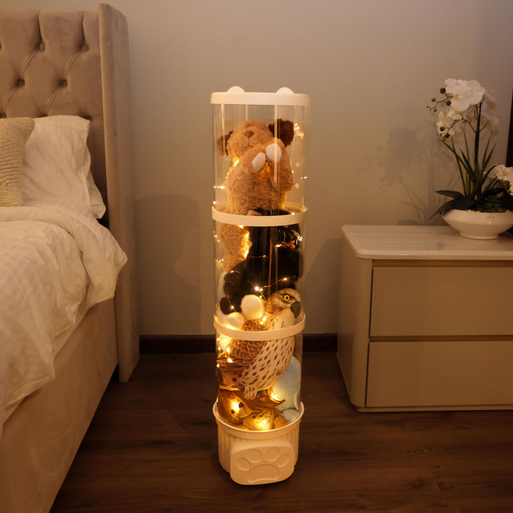 LALABOO blankets and soft items stored neatly in a tube organizer.