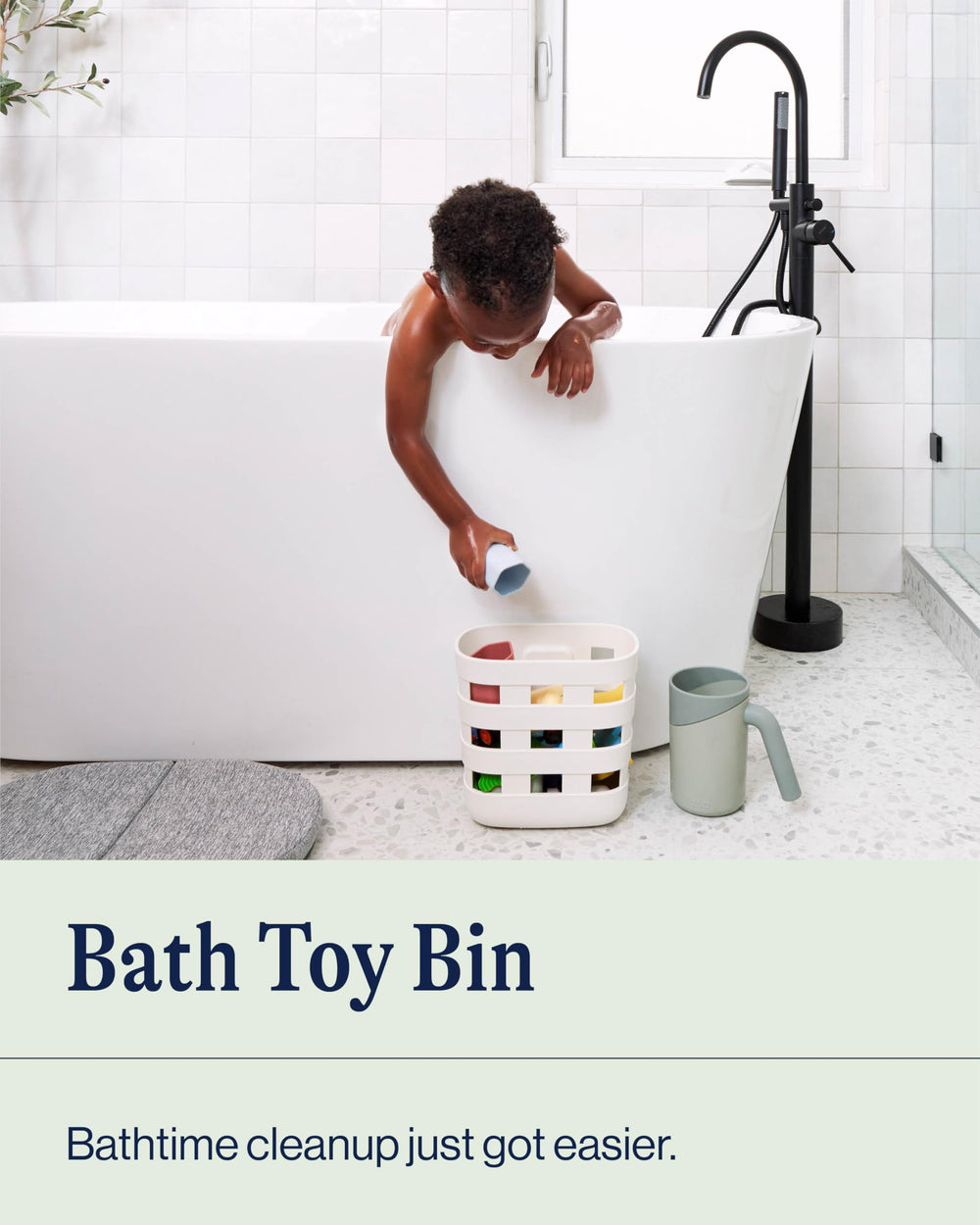 Lalo Bath Time Storage Bin's removable drying bin keeps bath items ready for next use.