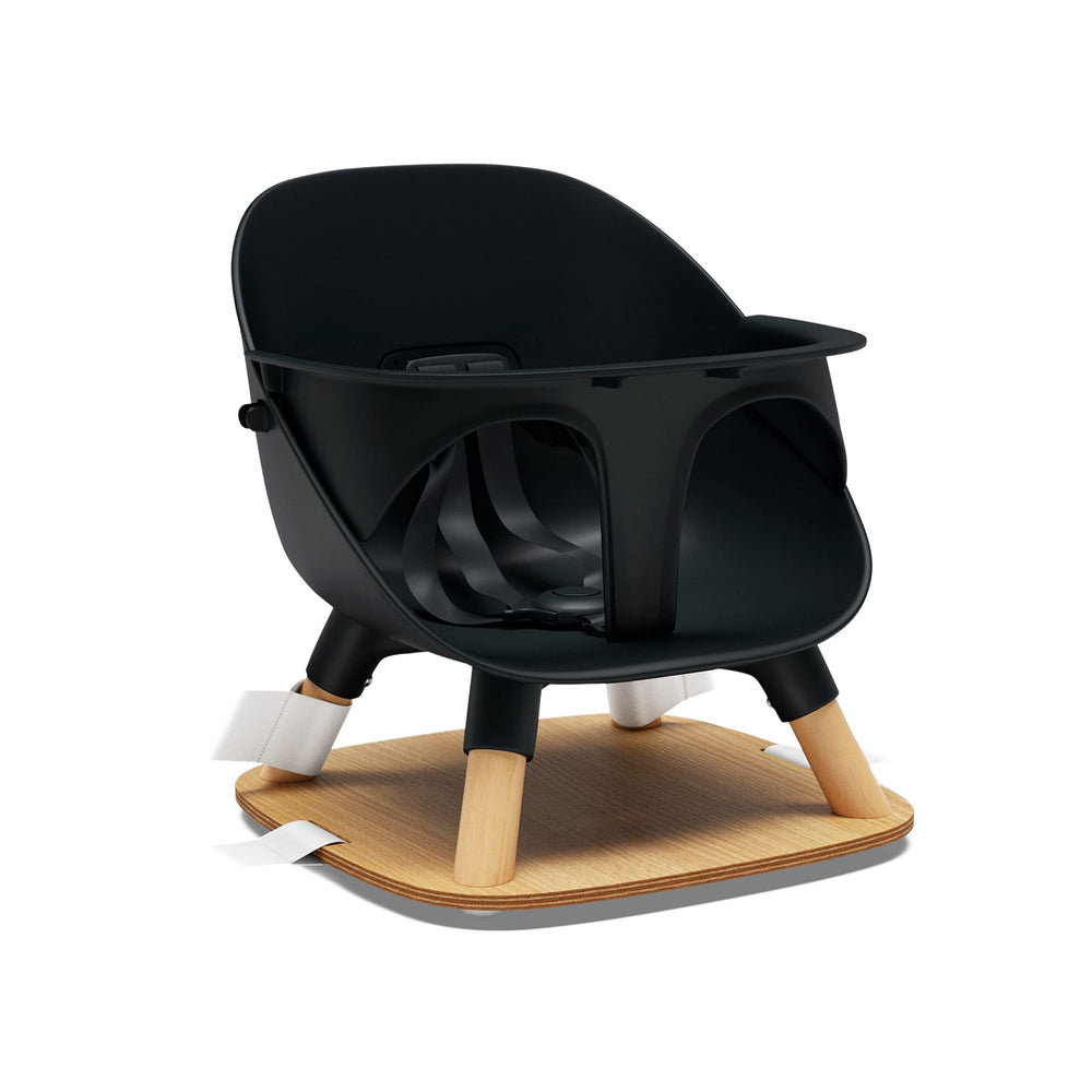 Lalo booster seat licorice front view, compact and secure at the table.