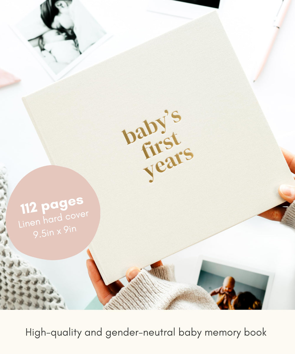 Lamare Baby First Year Book inside pages for milestones and photos.