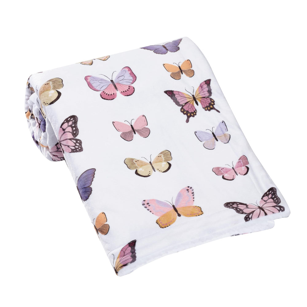 Lambs & Ivy Butterfly Dreams closeup of pink butterflies adds playful nursery charm.