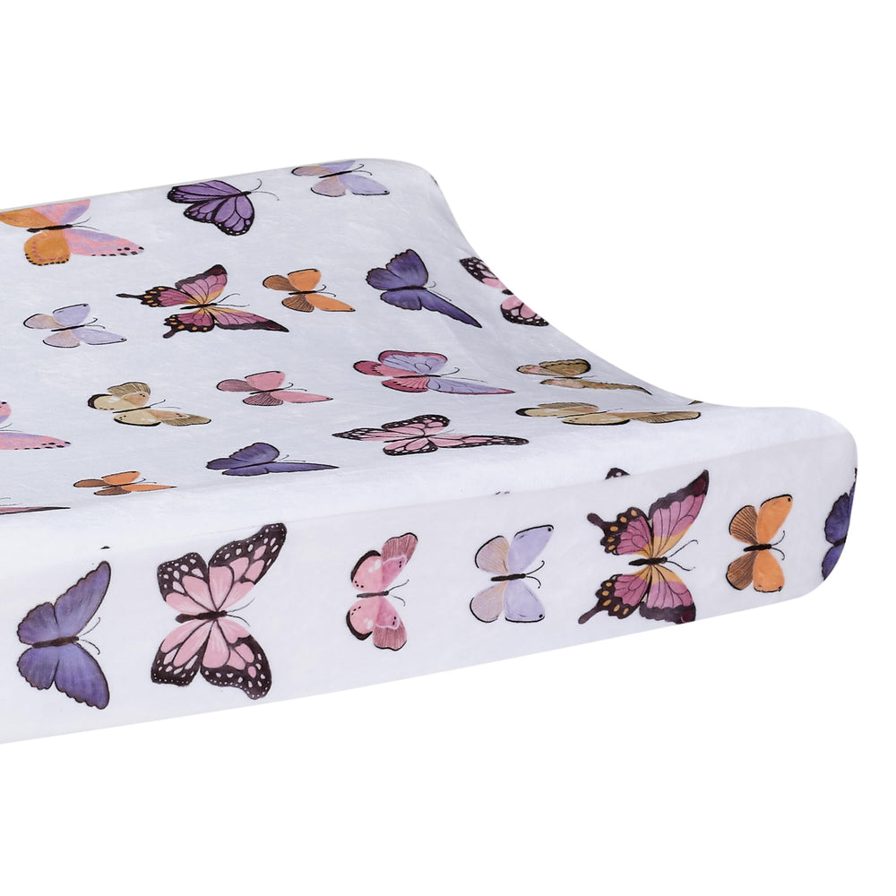 Lambs & Ivy Butterfly Dreams buttonhole safety straps support secure diaper changes.