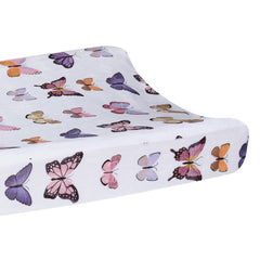 Lambs & Ivy Butterfly Dreams buttonhole safety straps support secure diaper changes.