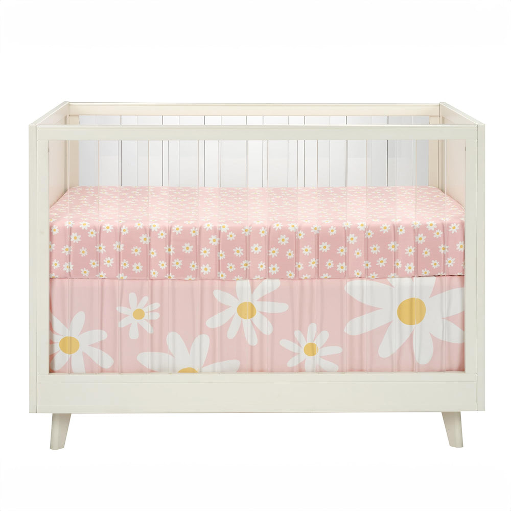 Lambs & Ivy Daisy Dreams machine-washable sheet simplifies nursery laundry.