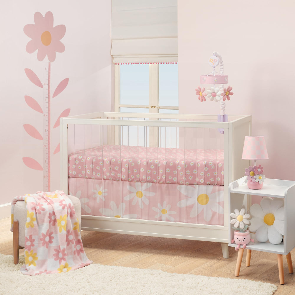 Lambs & Ivy Daisy Dreams rose-and-daisy design suits a gentle nursery look.