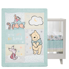 Lambs & Ivy Winnie the Pooh Hugs fitted sheet provides a snug crib fit