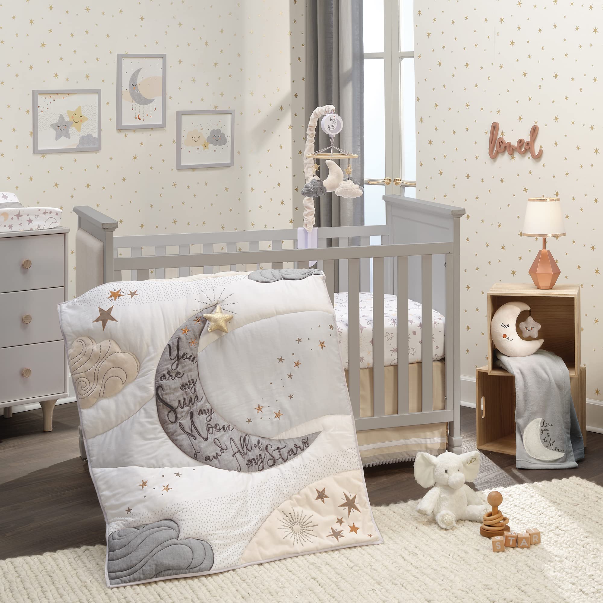 Lambs & Ivy Goodnight Moon mobile music notes indicating lullabies