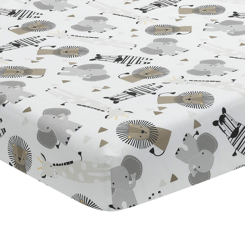 Lambs & Ivy Jungle Safari crib skirt with dotted trim enhances nursery decor.