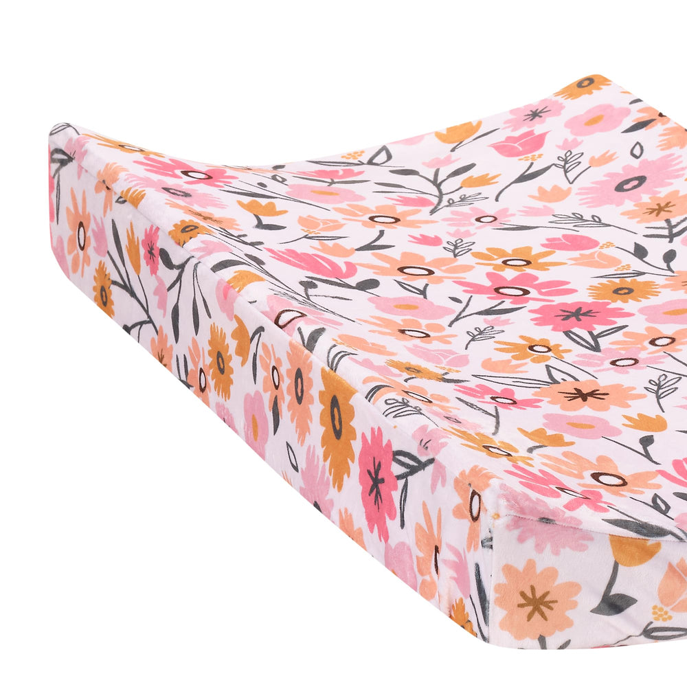 Lambs & Ivy Little Garden pink floral pattern changing pad cover enhances nursery decor