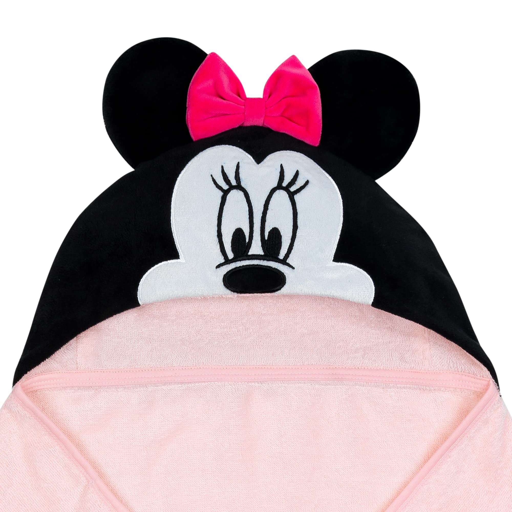 Lambs & Ivy Minnie Mouse hooded towel provides soft, absorbent cotton for cozy post-bath warmth