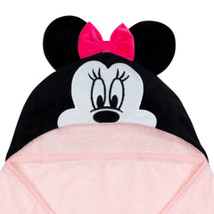Lambs & Ivy Minnie Mouse hooded towel provides soft, absorbent cotton for cozy post-bath warmth