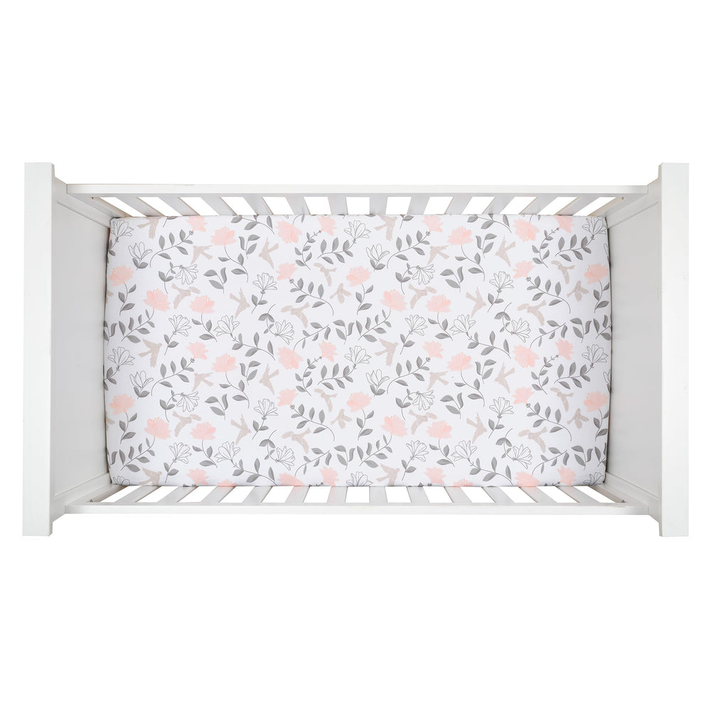 Lambs & Ivy Petals open-winged birds evoke a playful nursery scene.