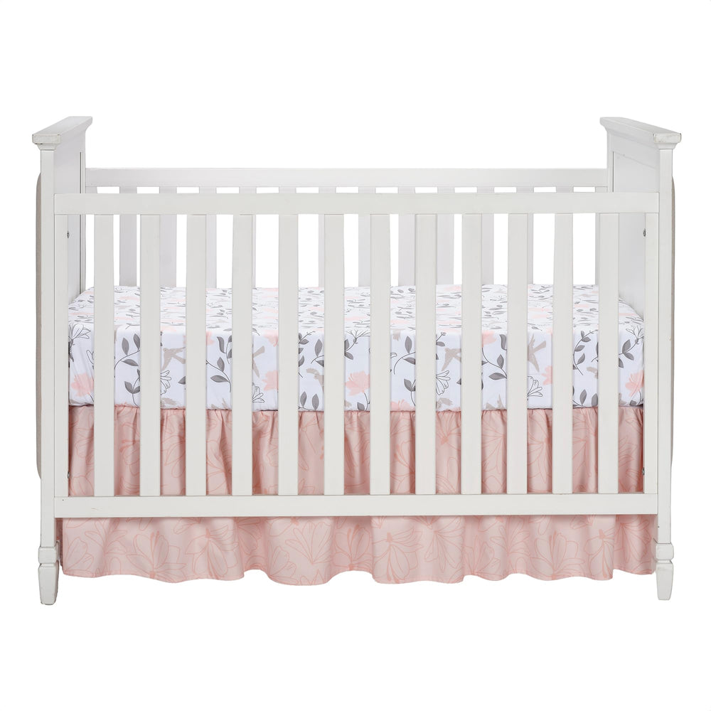 Lambs & Ivy Petals elastic-all-around fit keeps sheet secure.