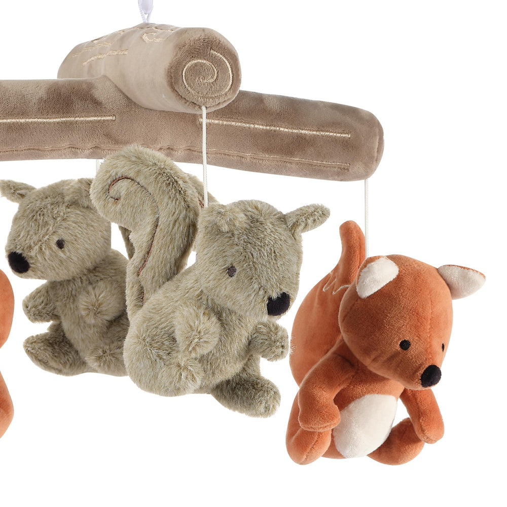 Lambs & Ivy plush forest animals close-up highlighting soft textures for baby touch.