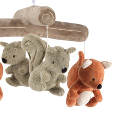 Lambs & Ivy plush forest animals close-up highlighting soft textures for baby touch.