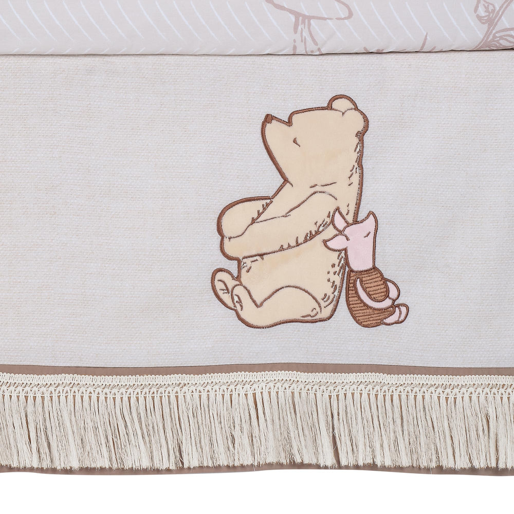 Lambs & Ivy Pooh Bear and Pals 3-piece set photographed with baby for sensory-rich photo moments.