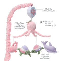 Lambs & Ivy Sea Dreams jellyfish centerpiece with pastel sea creatures in motion.