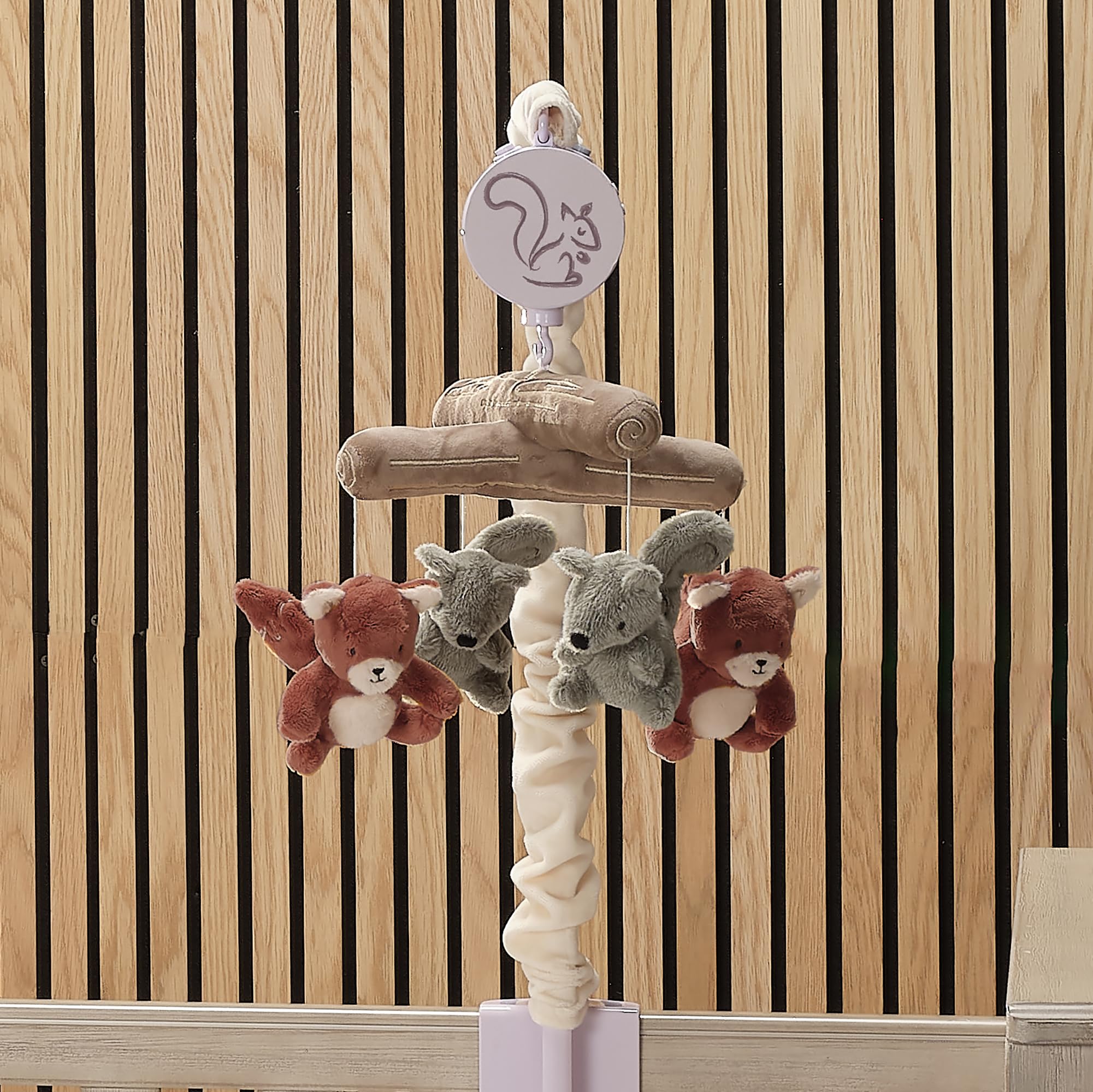 Lambs & Ivy soothing visuals help baby track movement and focus.