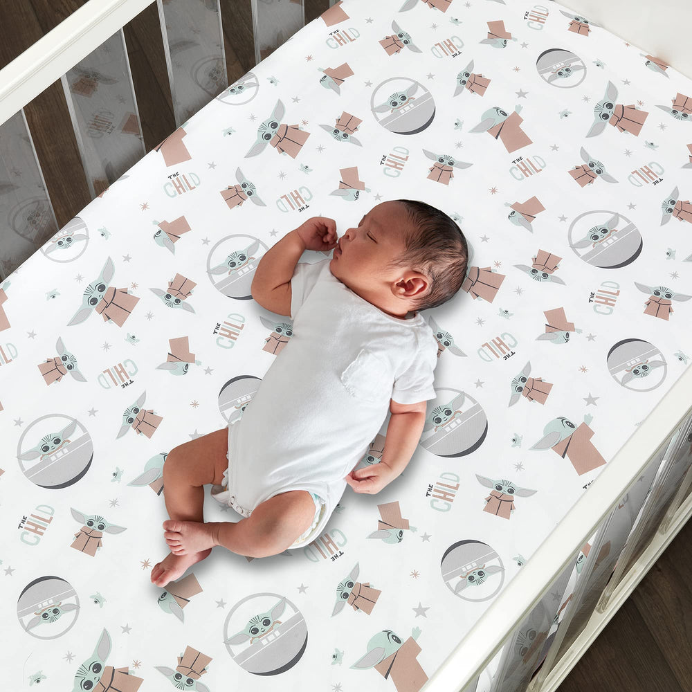Lambs & Ivy Star Wars The Child crib sheet with Baby Yoda motif keeps nurseries playful