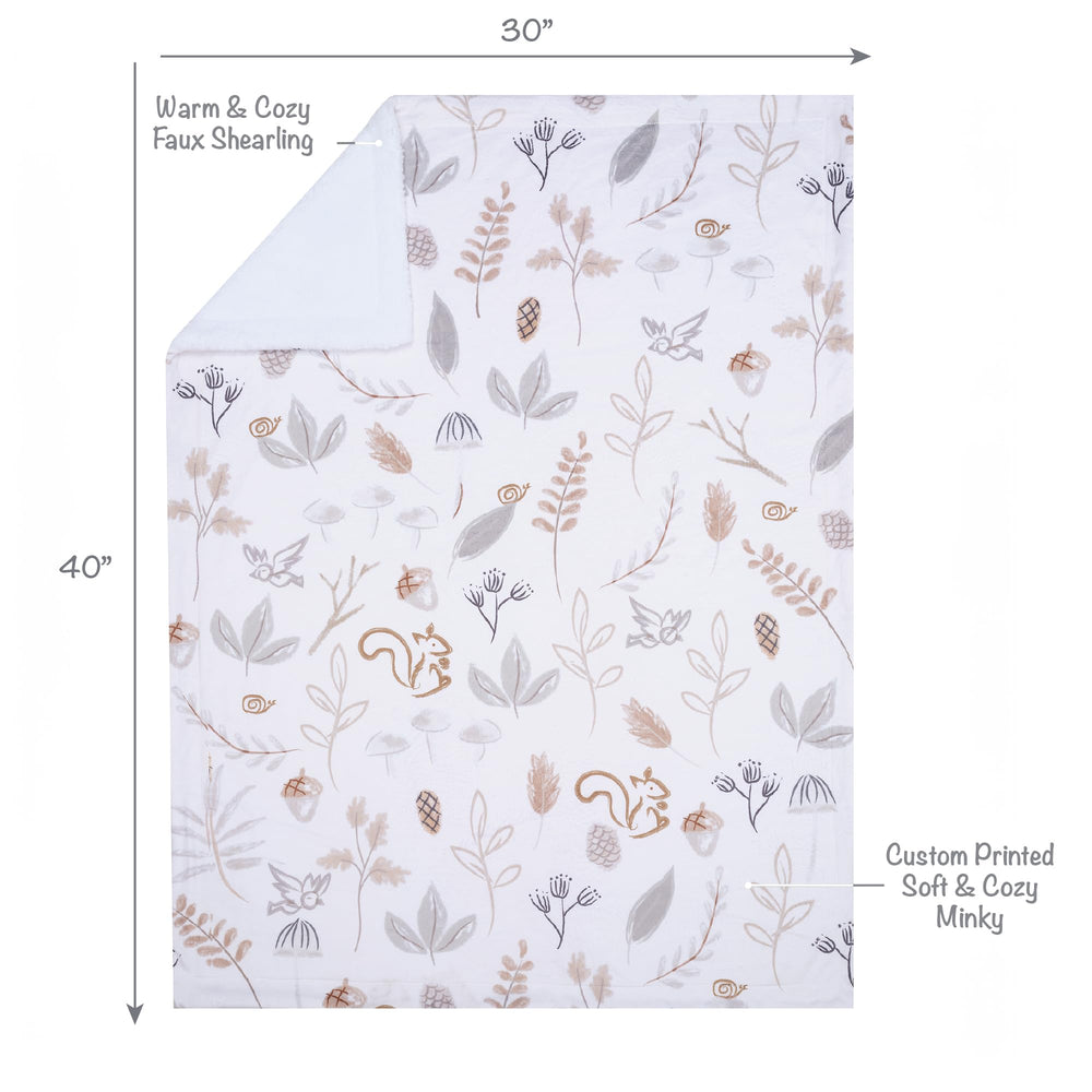 Lambs & Ivy treetop fox forest blanket back highlights soft faux shearling warmth.