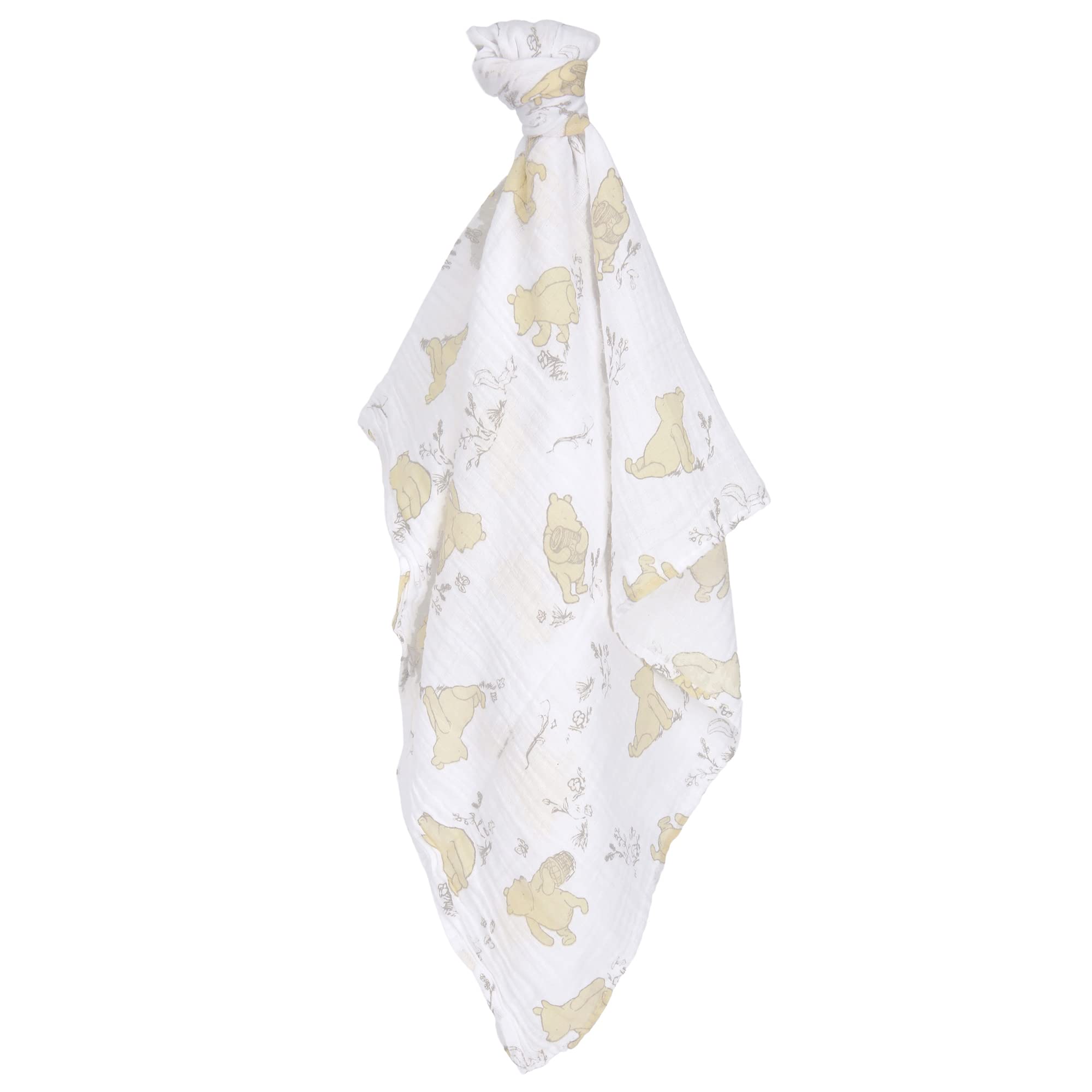 Lambs and Ivy Winnie the Pooh swaddle set in crib for soothing moments.