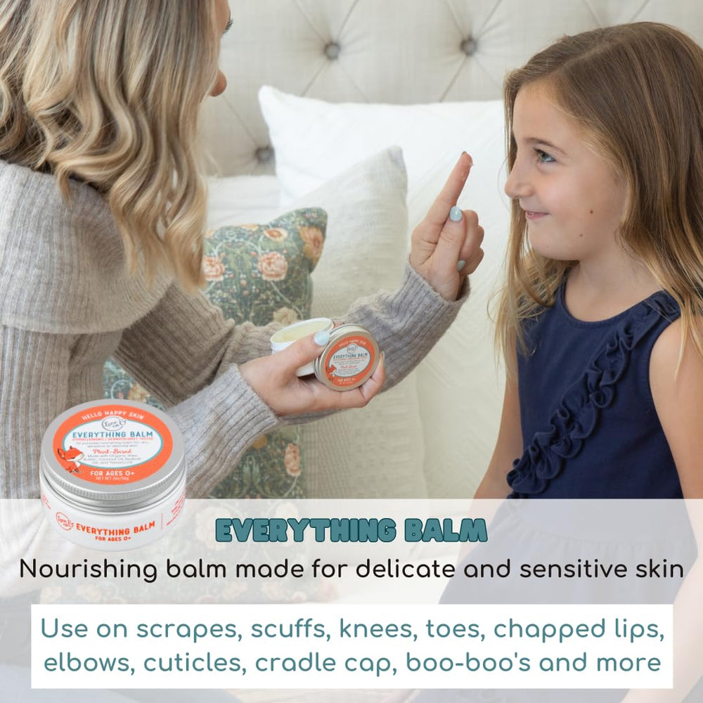 Lane & Co Everything Balm on dry skin elbows, providing gentle hydration.