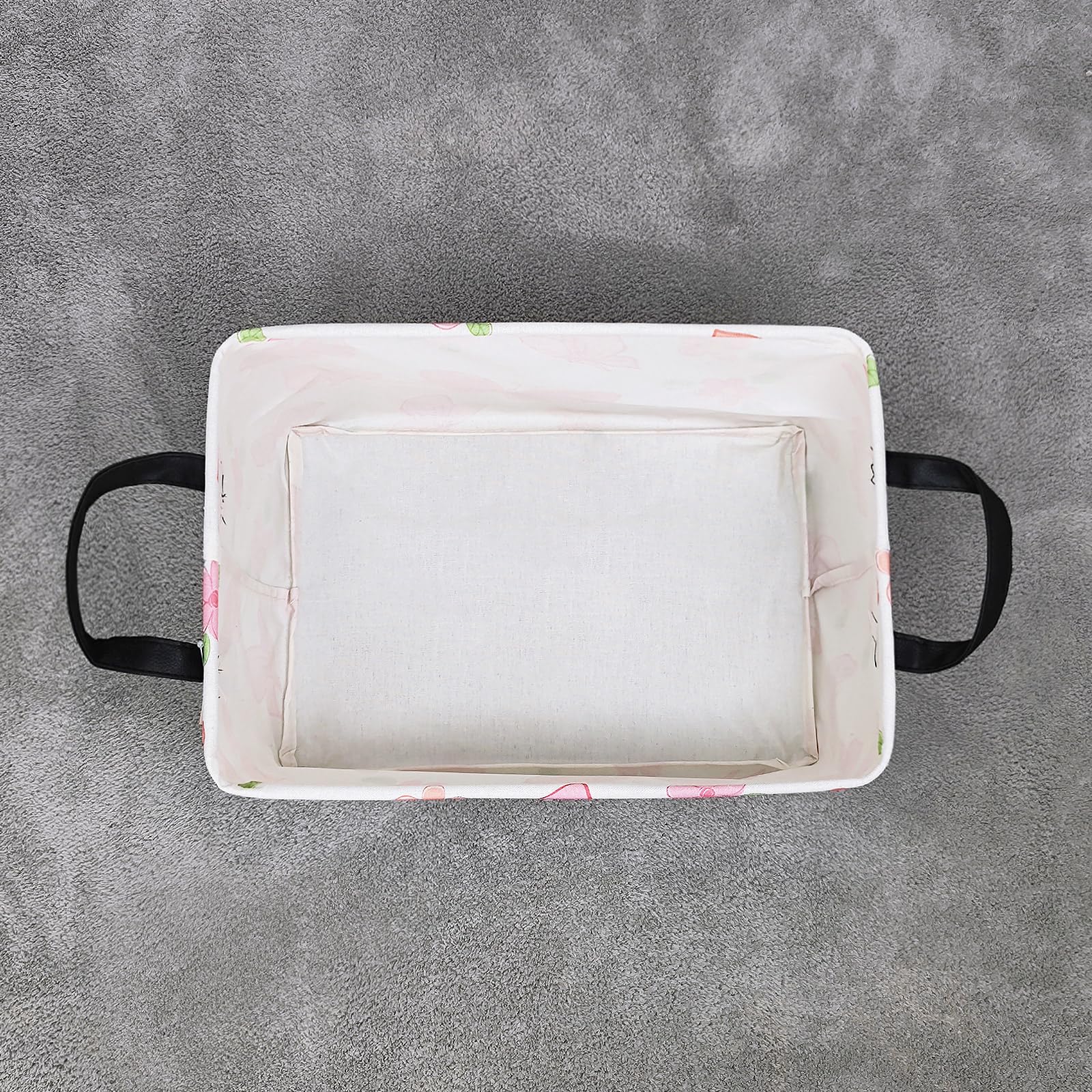 LANGYASHAN rectangular bin tucked under a bed for hidden storage.