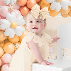 Lanmerry beige bow headband pairs with summer outfits for breathable comfort.