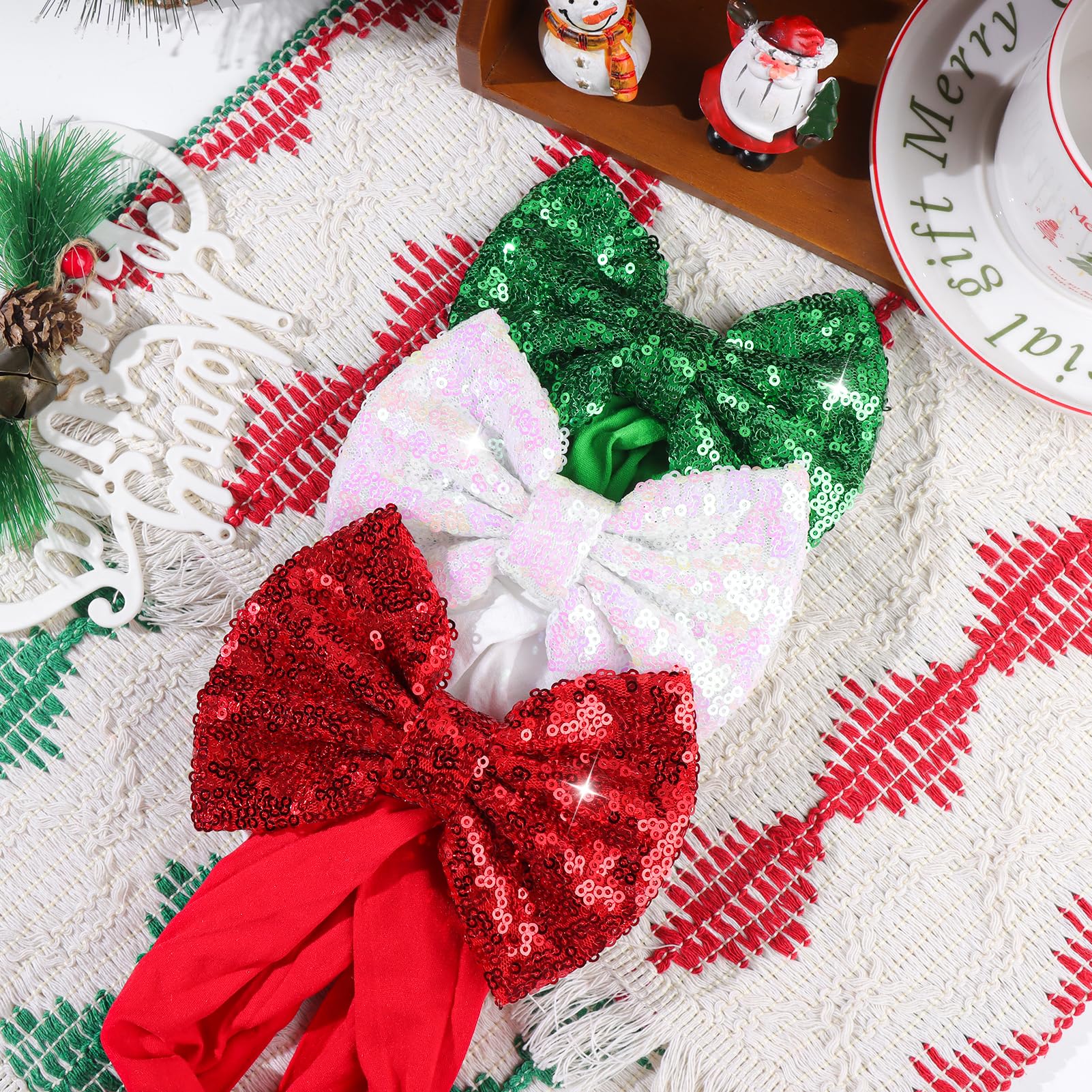 Lanmerry headbands with green butterfly-knot bows for playful Christmas outfits.