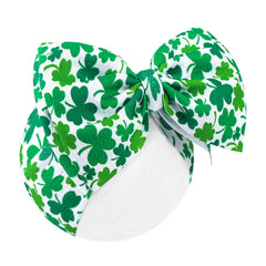 Lanmerry hairband with clover print for infants, festive style.