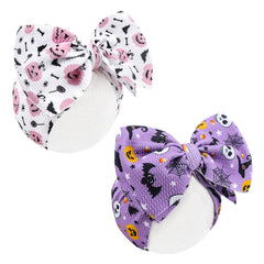 Lanmerry Halloween bow on purple headband; gentle on baby's skin.