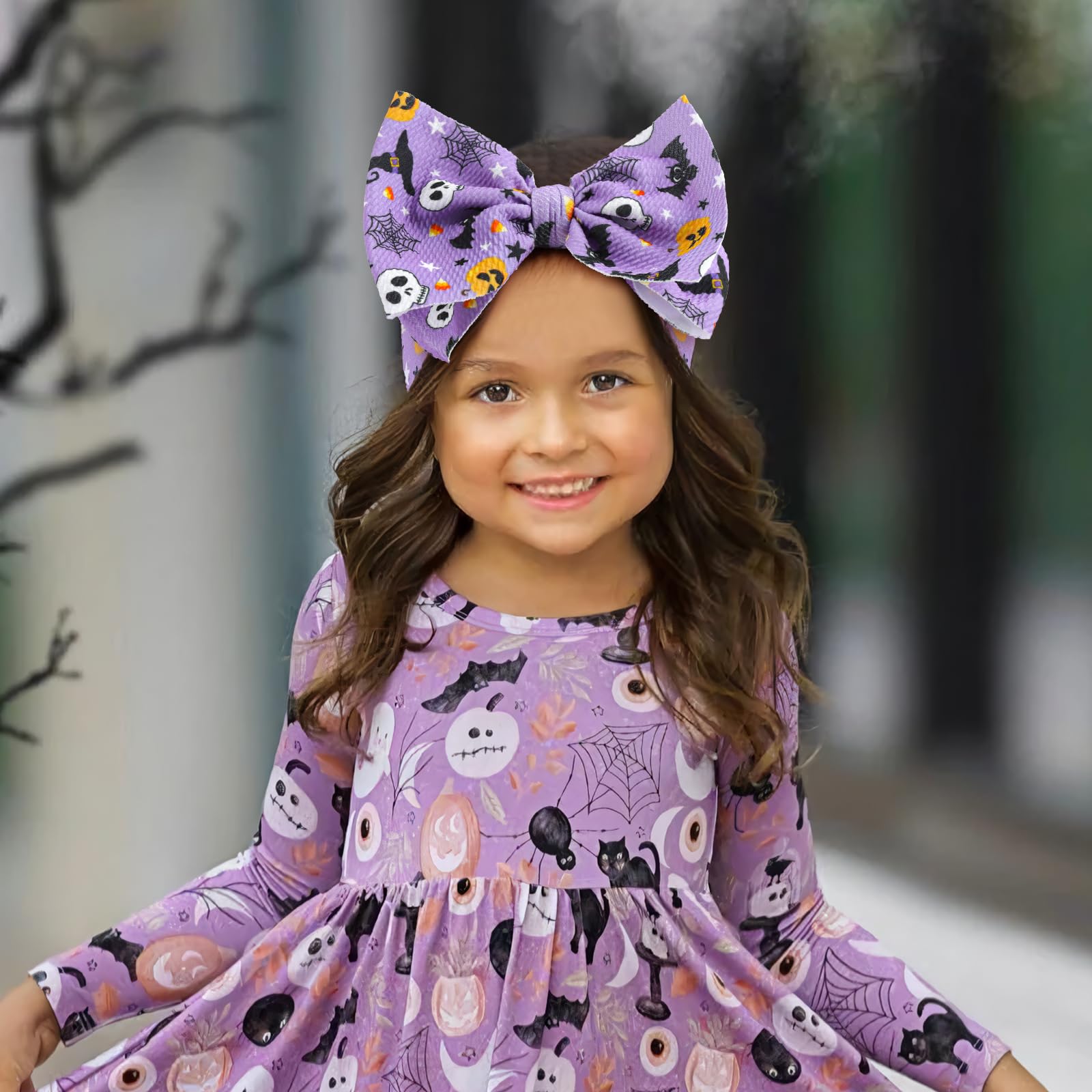 Lanmerry skull-pattern bow; playful spooky detail for outfits.