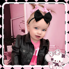 Lanmerry white baby bow headband adds classic charm to newborn outfits.
